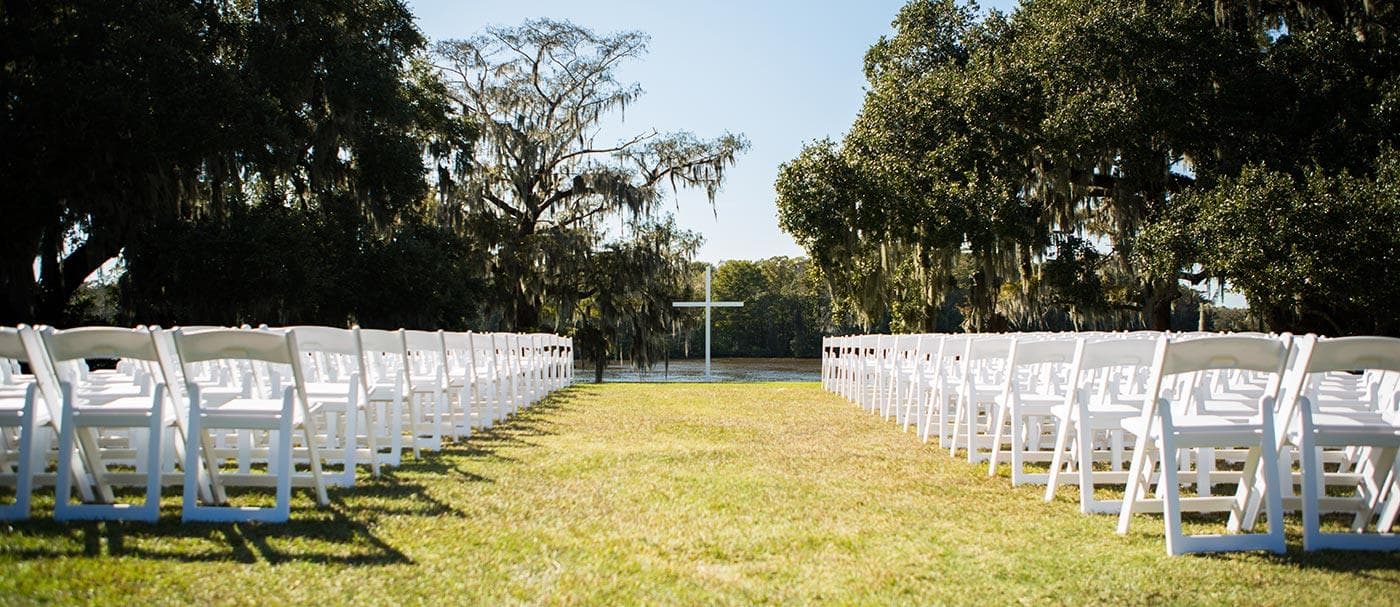 Wachesaw Plantation Club wedding ceremony white chairs Waccamaw River SC