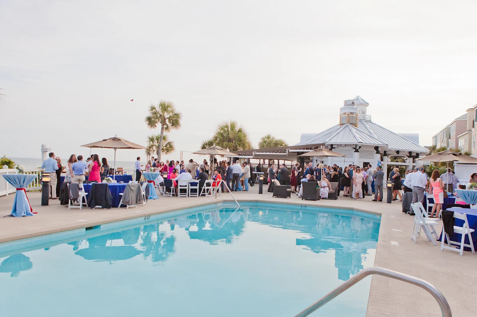 Poolside wedding reception at Wild Dunes Resort