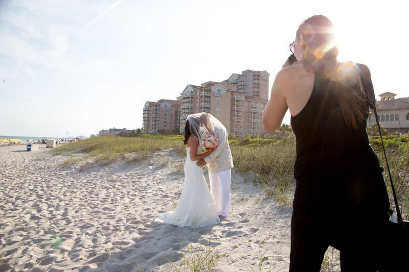 Bride and groom romantic beach portrait at sunset in Myrtle Beach