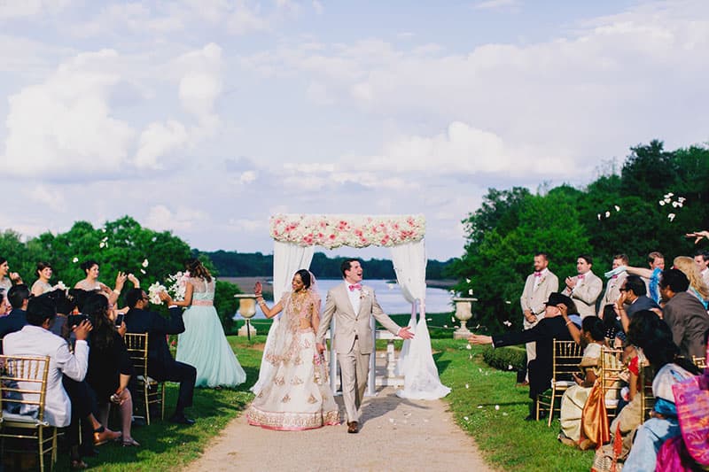 Wedding ceremony at Middleton Place moss-draped oaks Charleston