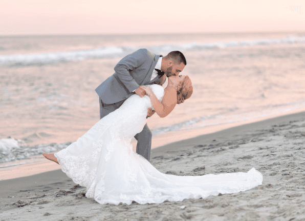 21 Main Events wedding couple beach ceremony North Beach